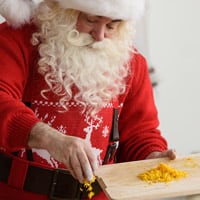 Santa preparing to cook a meal