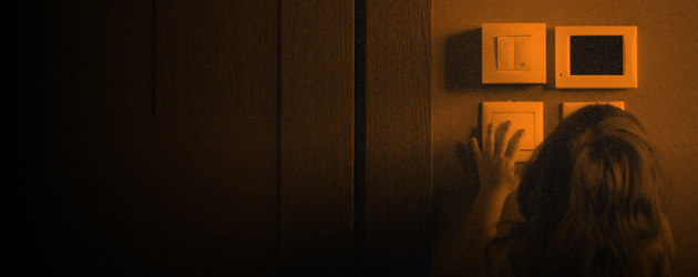 Child Pressing Light Switches