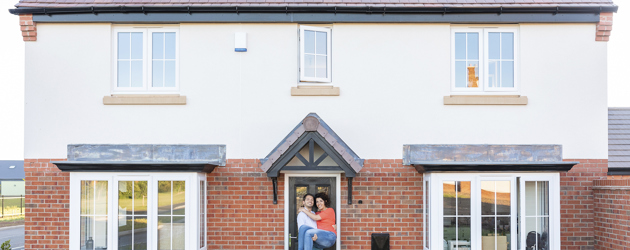 Couple Outside Home