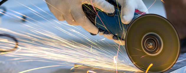 Angle Grinder In Hands