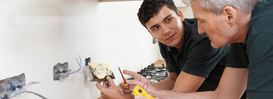 Electricians Checking Sockets