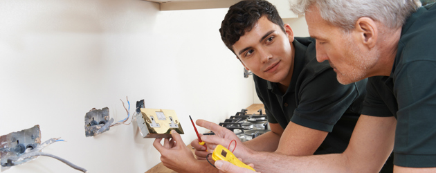 Electricians Checking Sockets