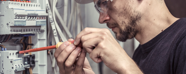 Man Working On Fuses