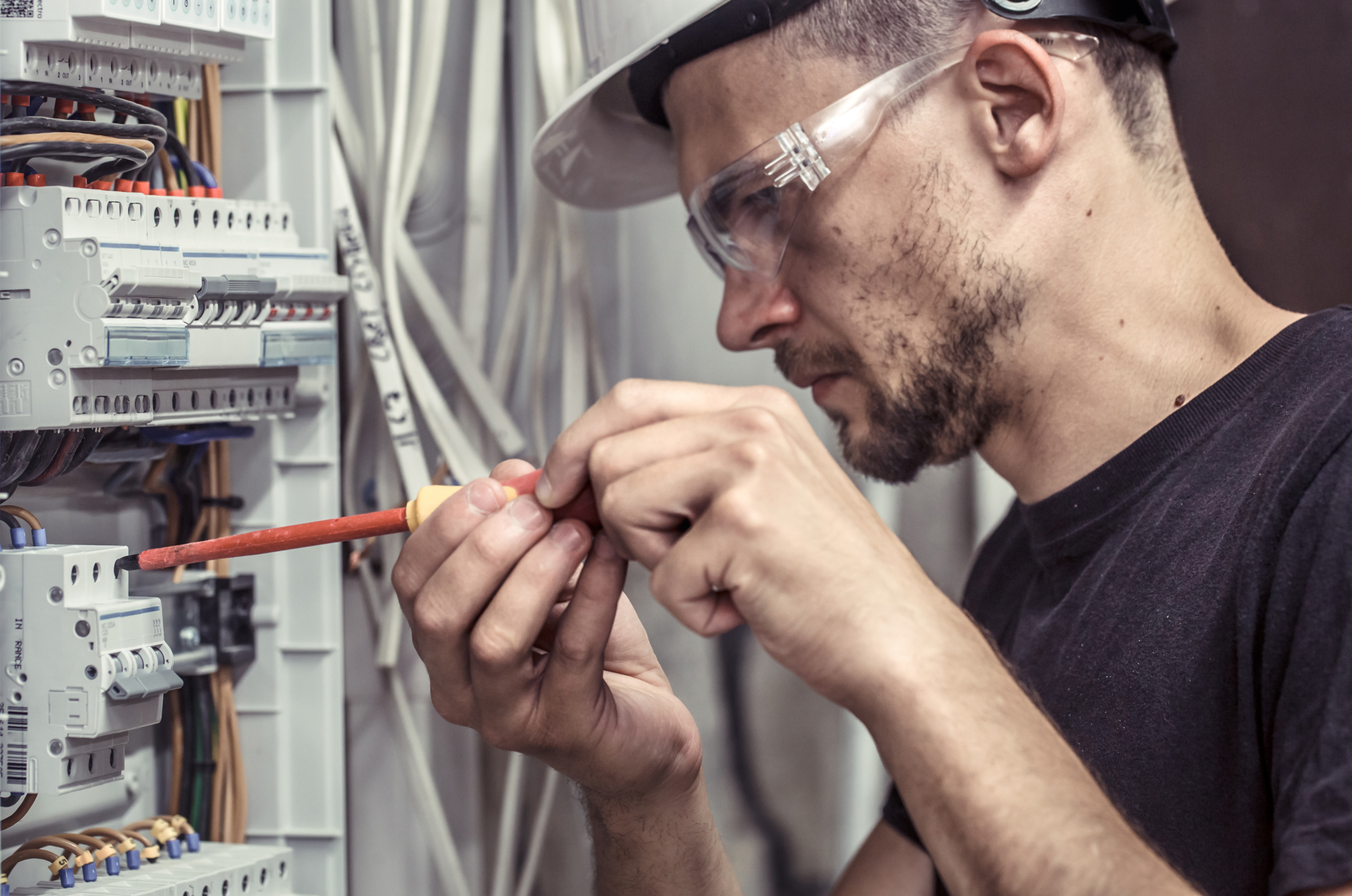 Man Working On Fuses
