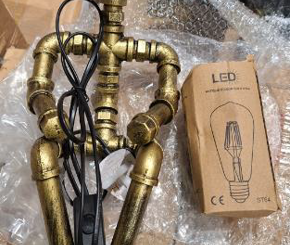 Plumbing Effect Sitting Person Portable Lamp